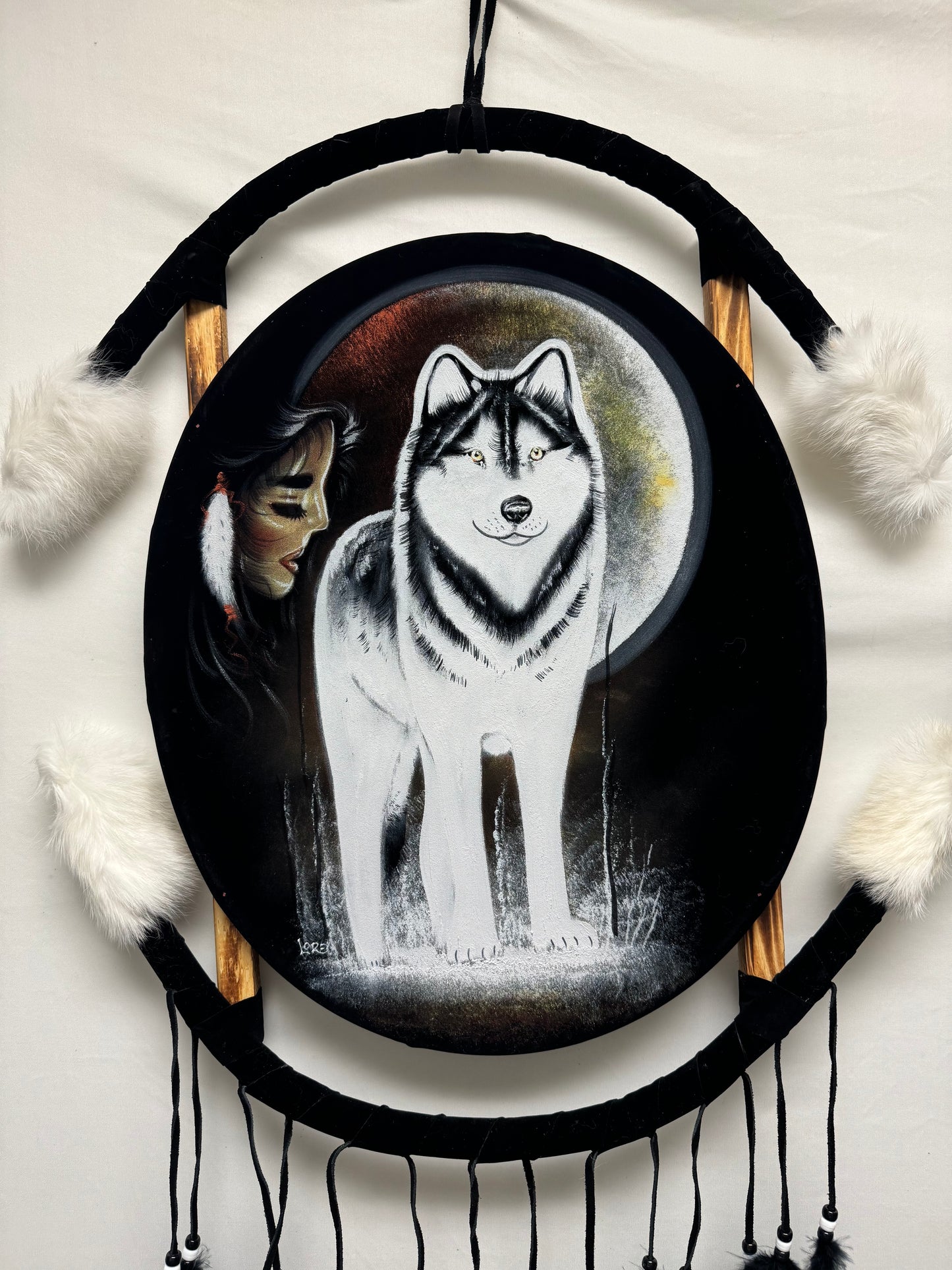 Hand-painted Native American dreamcatcher with wolf
