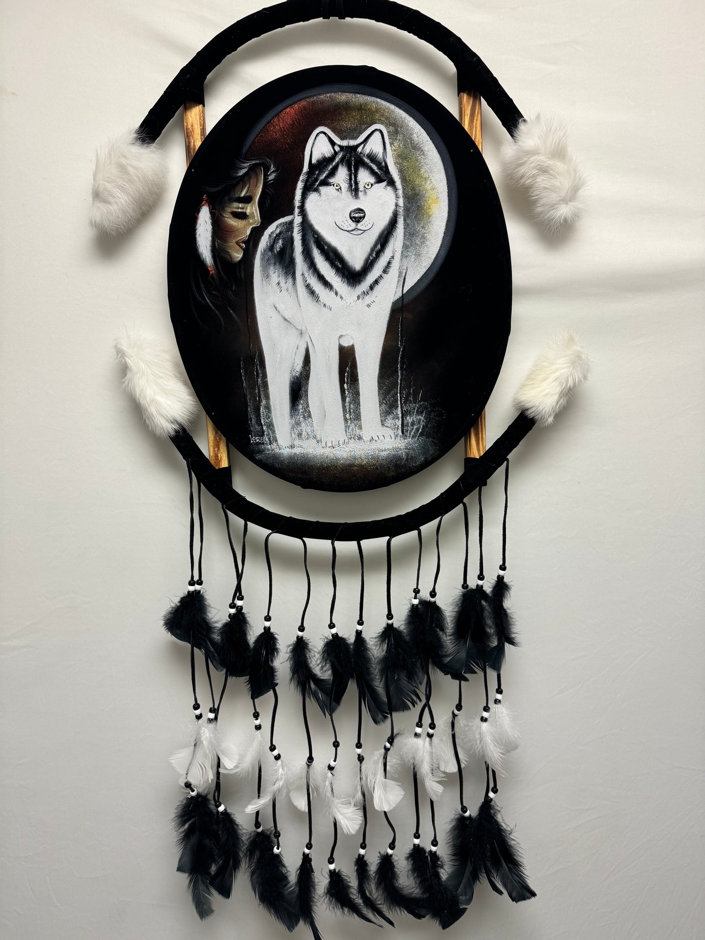 Hand-painted Native American dreamcatcher with wolf