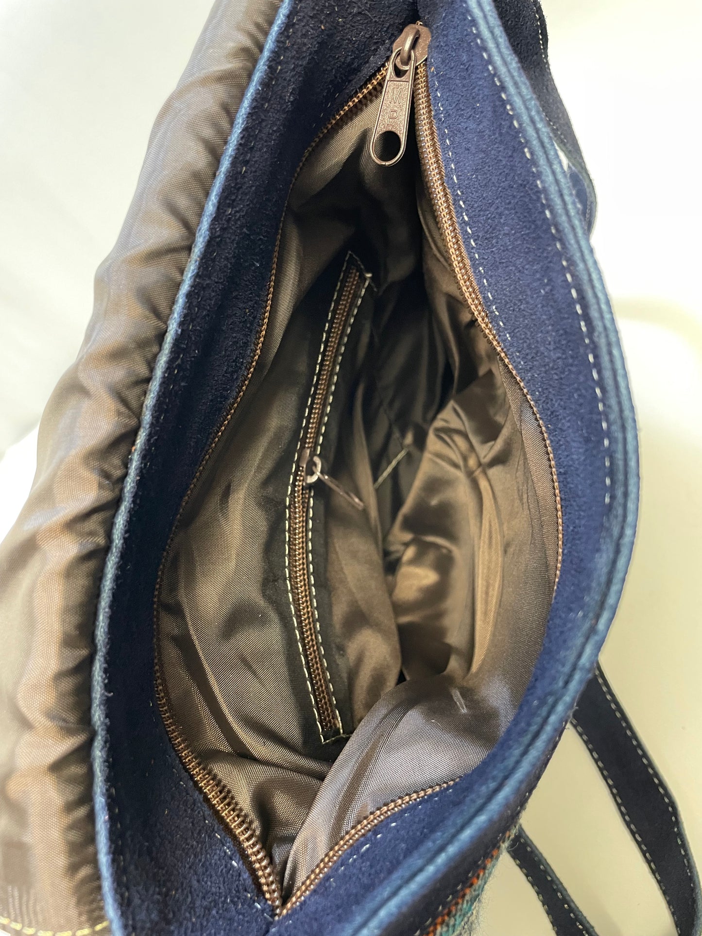 Leather bag with geometric wolf design