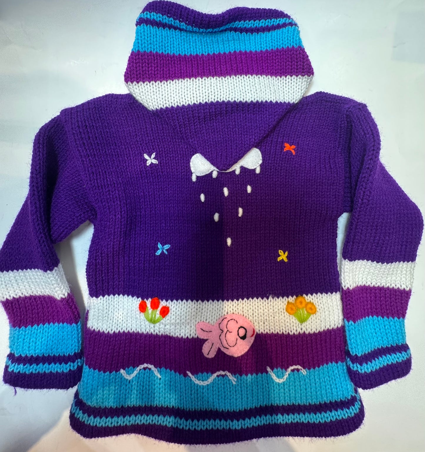 Children's sweater with a landscape design