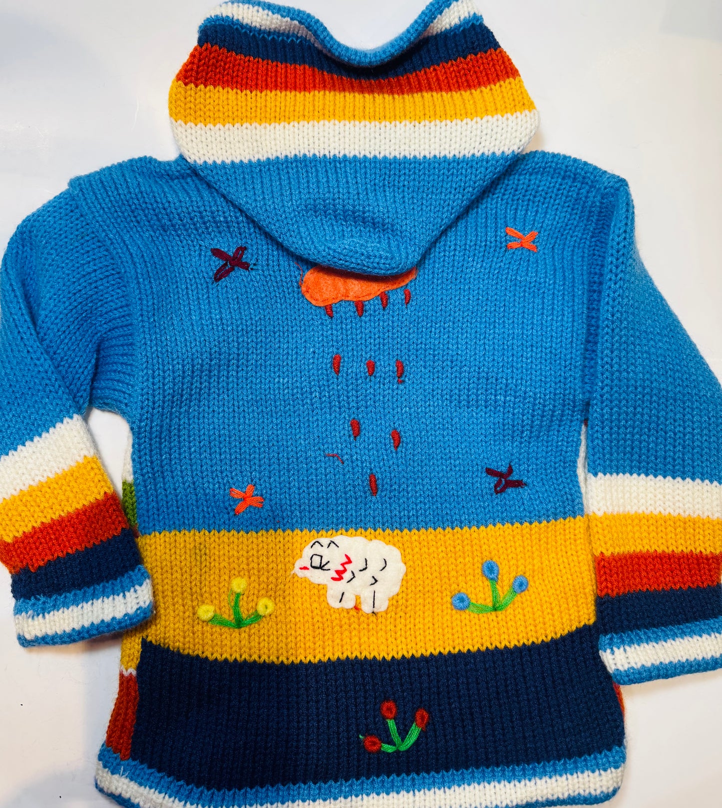 Children's sweater with a landscape design