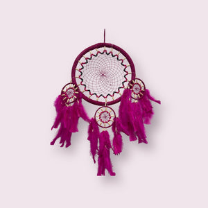 dream catcher and three babies